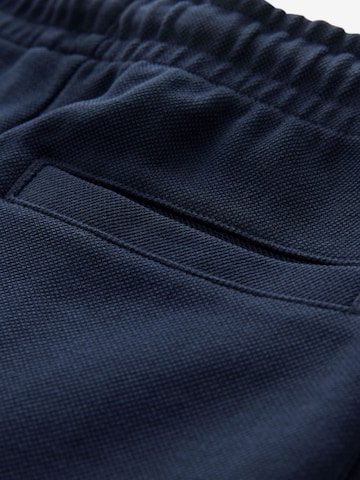 Next Tapered Broek in Blauw