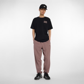new balance Tapered Broek in Bruin