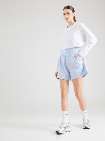 Largi Pantaloni de la Nike Sportswear pe albastru