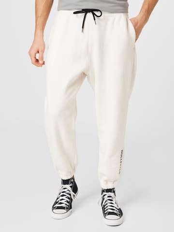 Effilé Pantalon HOLLISTER en beige : devant