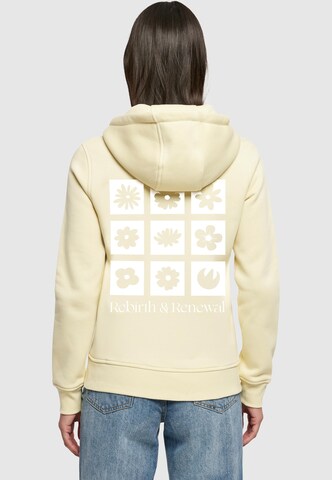Merchcode Sweatshirt 'Rebirth And Renewal' in Geel: voorkant