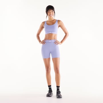 Skinny Pantalon de sport 'AC Fitted Short 5"' new balance en violet