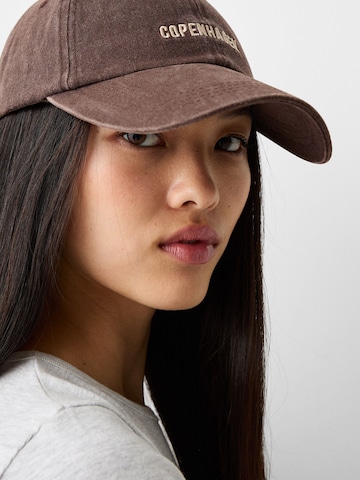 Cappello da baseball di Bershka in grigio