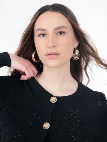 Influencer Плетена жилетка в черно