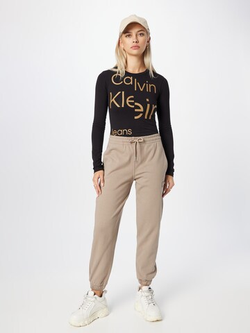 Calvin Klein Tapered Housut värissä beige