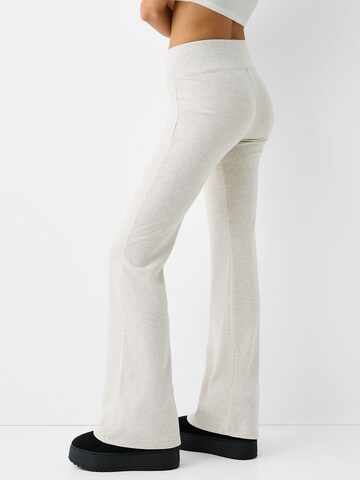 Bershka Flared Trousers in Beige