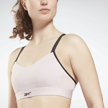 Reebok Bustier Športni nederček | roza barva: sprednja stran