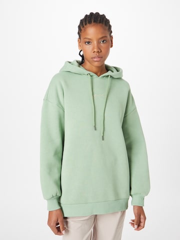 Karl Kani Sweatshirt 'KW224-055-2 KK Small Signature' in Green: front