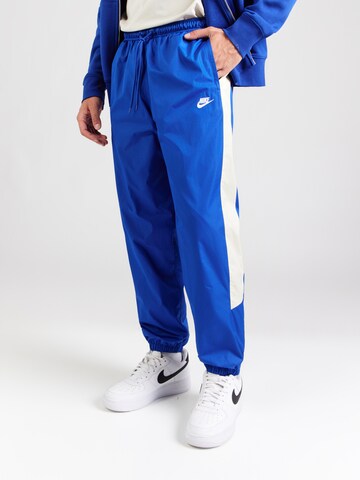 mėlyna Nike Sportswear Siaurėjantis Kelnės: priekis