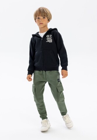 MINOTI Tapered Hose in Grün