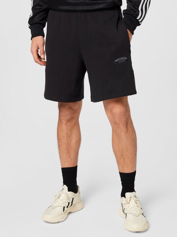 regular Pantaloni di ADIDAS ORIGINALS in nero: frontale