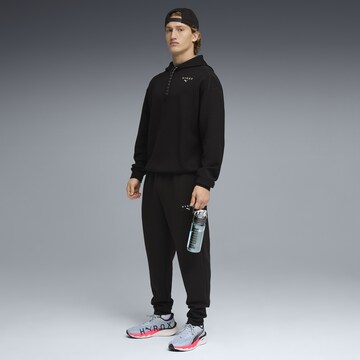 PUMA Sports sweatshirt in Black