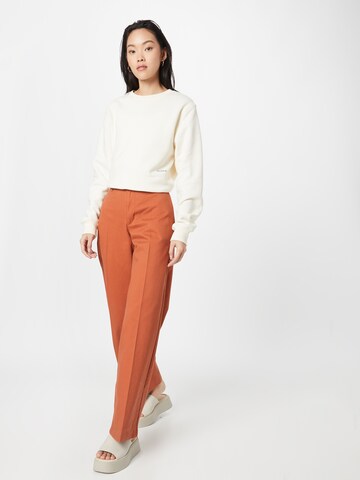 LEVI'S ® Loosefit Pressveckad byxa 'Baggy Trouser' i orange