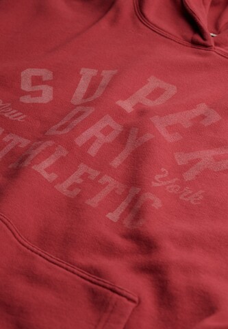 Sweat-shirt 'Athletic Essentials' Superdry & Co en rouge
