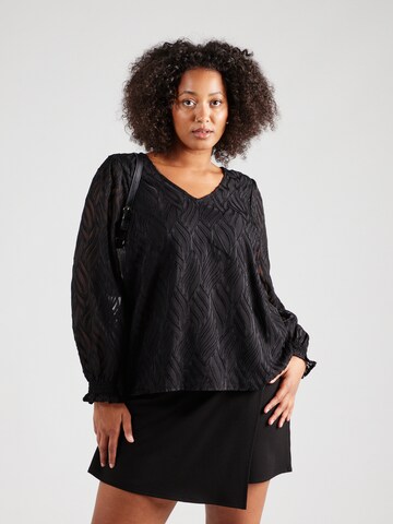 EVOKED - Blusa 'VITUTTA' en negro: frente
