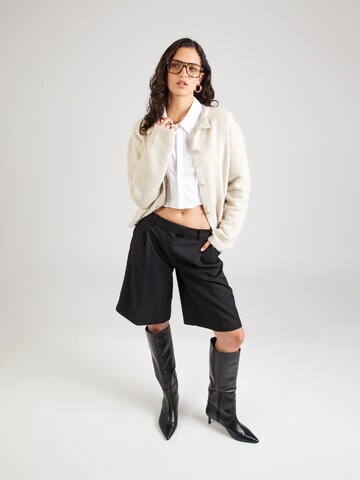 Cardigan Cartoon en beige