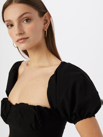 Femme Luxe - Blusa 'FLO' en negro