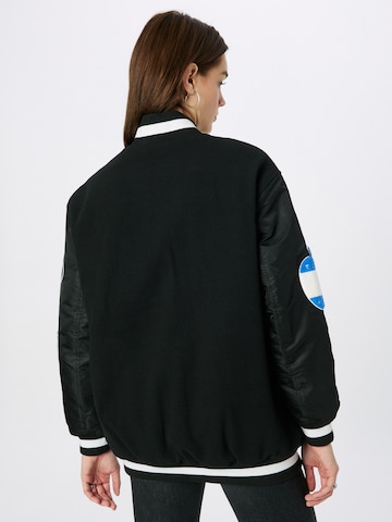 Tommy Jeans Between-Season Jacket 'Letterman' in Black