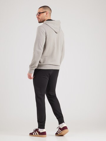 Champion Authentic Athletic Apparel Φόρμα τρεξίματος σε γκρι