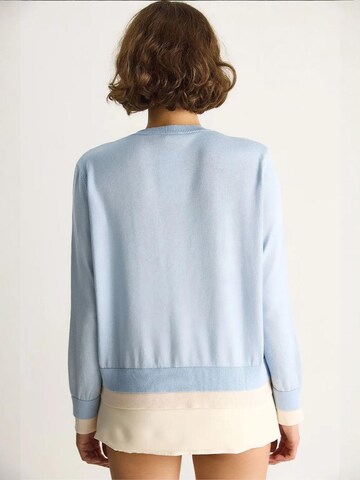 Cardigan Bianco Lucci en bleu