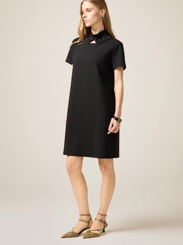 Abito di oltre in nero