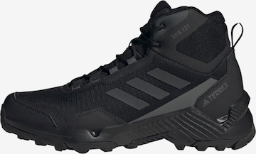 ADIDAS PERFORMANCE Boots in Black: front