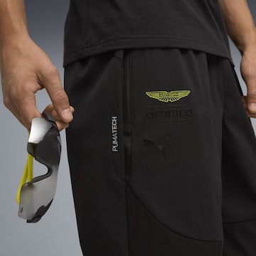 PUMA Regular Sports trousers in Black