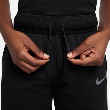 NIKE Regular Workout Pants in Black