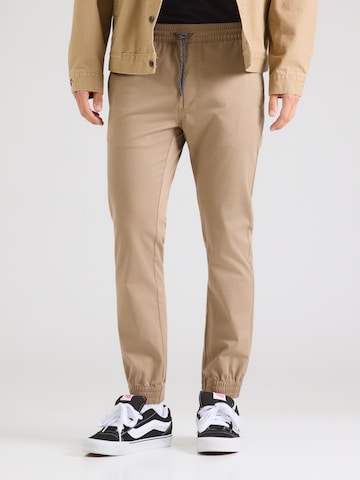 Volcom Конический (Tapered) Штаны 'FRICKIN' в Бежевый: спереди