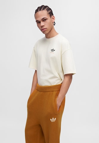 ruda ADIDAS ORIGINALS „Baggy“ Kelnės