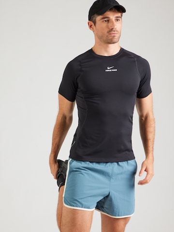T-Shirt fonctionnel 'NPT' NIKE en noir : devant