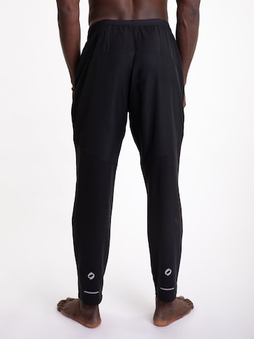 mymotus Loosefit Sportbroek 'Mymotus Men Trainingshose Black RM91 NOS' in Zwart