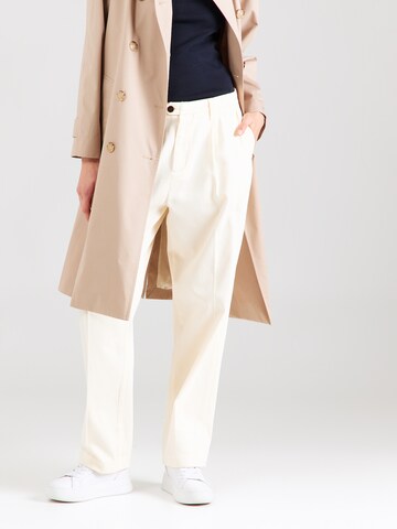 Regular Pantalon à plis TOMMY HILFIGER en beige : devant