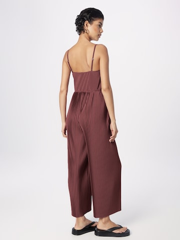 Tuta jumpsuit 'Jessie' di ABOUT YOU in rosso