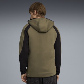 PUMA Sportsweatjacke 'Evostripe' in Grün