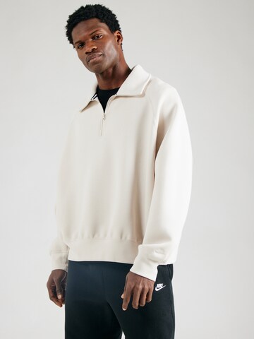 Sweat-shirt 'TCH FLC' Nike Sportswear en beige : devant