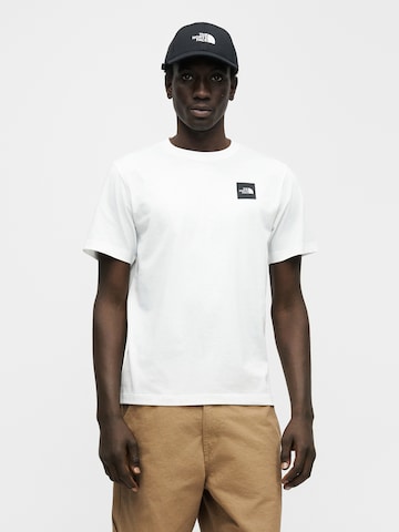 THE NORTH FACE Bluser & t-shirts 'EVOLUTION' i hvid: forside