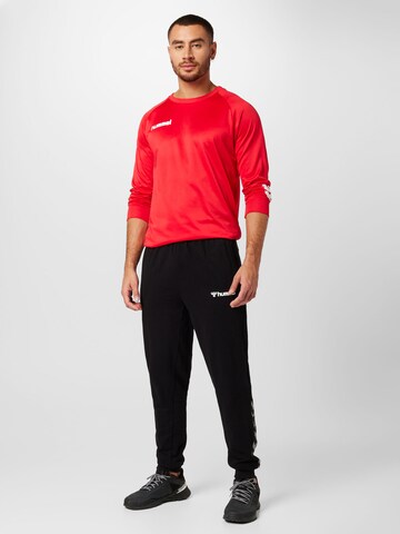 Hummel Tapered Sports trousers in Black