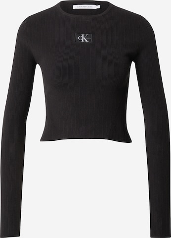 Pull-over Calvin Klein Jeans en noir : devant