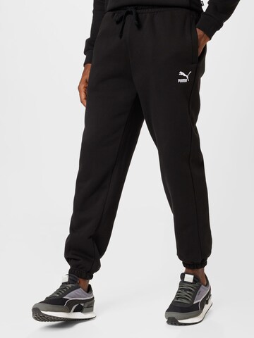 PUMA Tapered Pants in Black: front