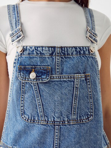 Bershka Dungaree skirt in Blue