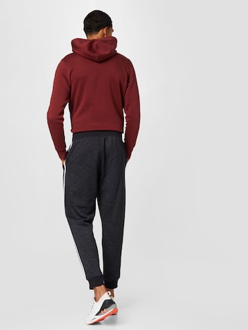 UNDER ARMOUR Regular Sportbroek in Zwart