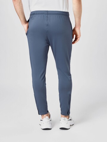 NIKE Slim fit Workout Pants in Blue