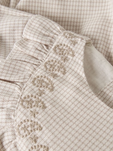 Tutina / body per bambino di Lil'Atelier in bianco
