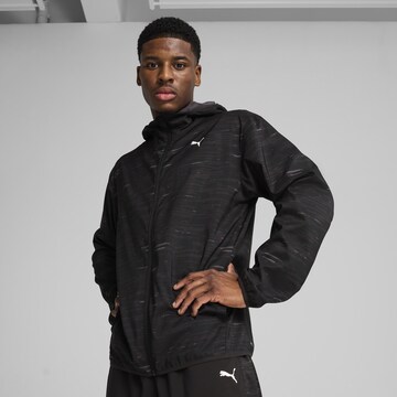 PUMA Training jacket 'Tad Essentials' in Black: front