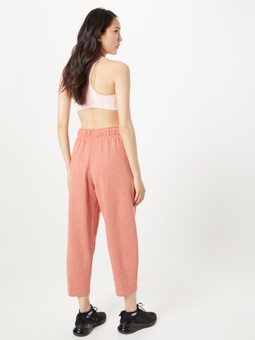 Nike Sportswear Loose fit Pants in Orange