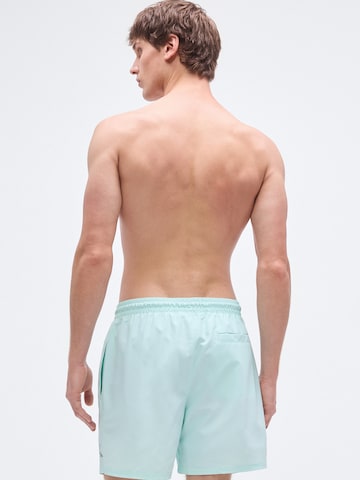 Calvin Klein Swimwear Hlače za k noši | zelena barva
