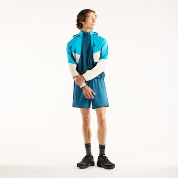 new balance - Chaqueta deportiva en azul