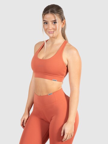 Smilodox Bustier Sport bh 'Advance Pro' in Oranje: voorkant