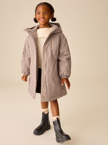 Next Kappa i beige: framsida